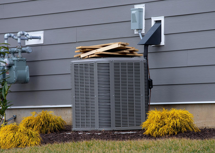 An outdoor unit with debris on it