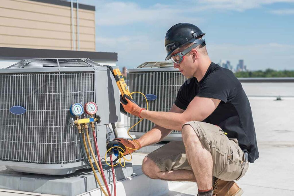 An HVAC contractor at work